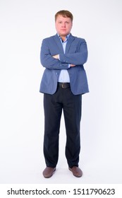 Full Body Shot Of Overweight Businessman In Suit With Arms Crossed