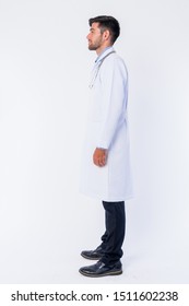 Full Body Shot Profile View Of Young Bearded Persian Man Doctor