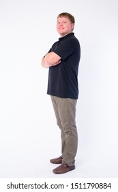 Full Body Shot Profile View Of Happy Overweight Man Looking At Camera