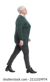 Full Body Shot Profile View Of Senior Businesswoman Walking