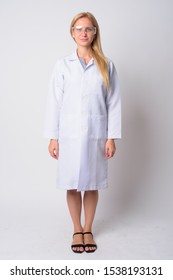 Full Body Shot Of Young Beautiful Blonde Woman Doctor As Scientist