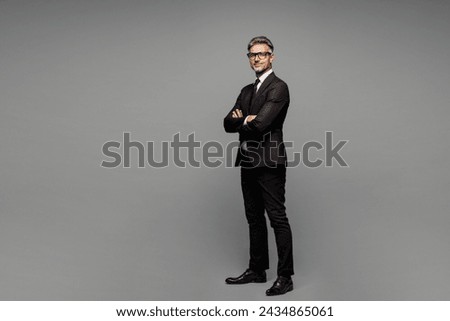 Similar – Image, Stock Photo Side view of young excited man is engaged in a virtual reality game wearing a VR headset and using controllers