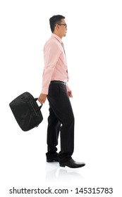 Full Body Side View Young Asian Businessman Walking With Briefcase, Isolated On White Background