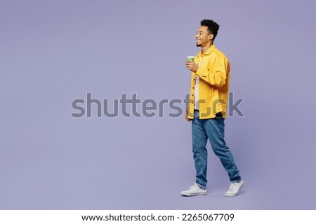 Similar – Image, Stock Photo Full body side view of confident African American male athlete in activewear with concentration stretching arms while standing looking away against white background
