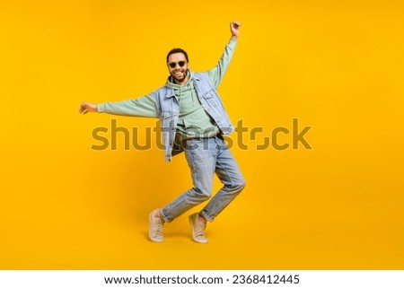 Full body size cadre of funky crazy cheerful macho playful dance have fun tiptoes have fun positive isolated on yellow color background