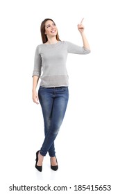 Full Body Of A Standing Casual Woman Pointing At Side Isolated On A White Background              