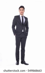 Full Body Young Businessman Standing On White Background