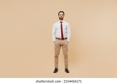 Full Body Young Confident Serious Successful Employee Business Man Corporate Lawyer 20s Wear White Shirt Red Tie Glasses Work In Office Look Camera Isolated On Plain Beige Background Studio Portrait