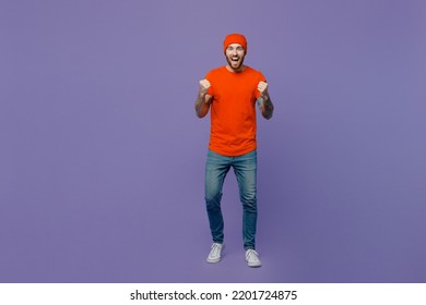 Full Body Young European Man 20s He Wear Red Hat T-shirt Doing Winner Gesture Isolated On Plain Pastel Light Purple Background Studio Portrait. People Lifestyle Concept Tattoo Translates Life Is Fight