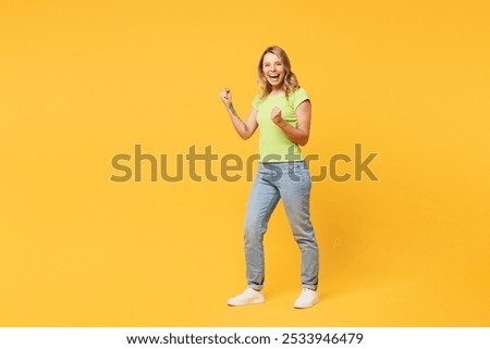 Similar – Pretty woman with OKAY sign, ok gesture. Happy lady, correct choice, yellow wall