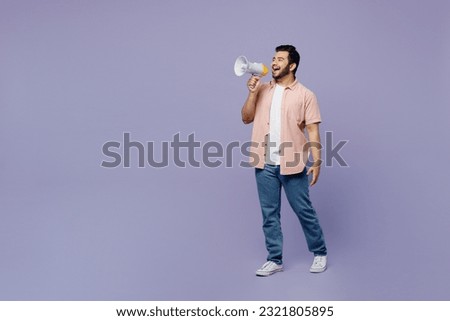 Full body young Indian man wear pink shirt white t-shirt casual clothes hold in hand megaphone scream announces discounts sale Hurry up isolated on plain pastel light purple background studio portrait