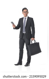 Full Body,portrait Businessman In Black Suit ,tie ,using Cellphone, Handbag Standing Isolated On White Background,