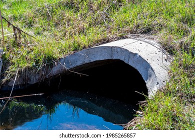 Full Capacity Concrete Culvert With Sheen Contaminated Storm Water Runoff