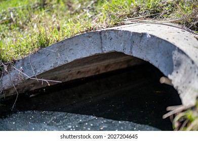 Full Capacity Concrete Culvert With Sheen Contaminated Storm Water Runoff