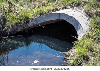 Full Capacity Concrete Culvert With Sheen Contaminated Storm Water Runoff