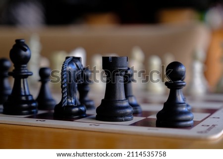 Full chess board. Close up of figurines