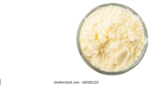 Full Cream Milk Powder In A Glass Over White Background