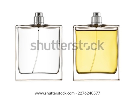 Full and empty glass bottles perfume spray isolated on white background