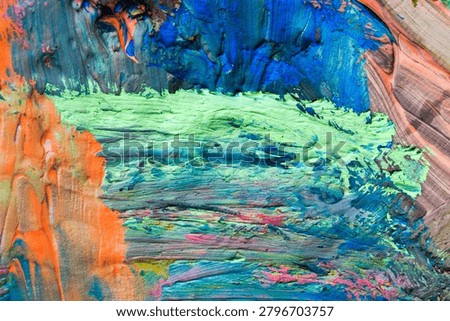 Full frame abstract texture of thick colorful paint strokes
