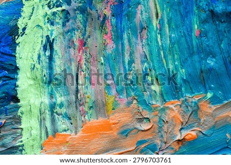 Full frame abstract texture of thick colorful paint strokes