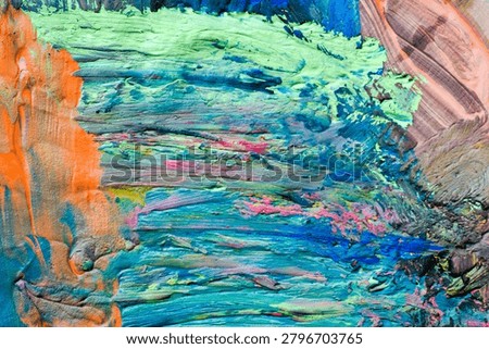 Full frame abstract texture of thick colorful paint strokes