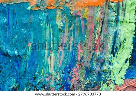 Full frame abstract texture of thick colorful paint strokes