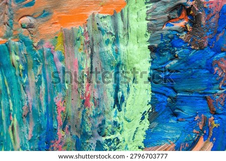 Full frame abstract texture of thick colorful paint strokes
