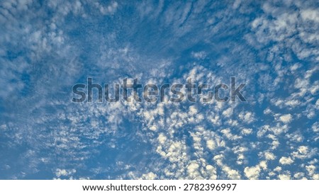 Full frame of beautiful cirrocumulus clouds texture in the blue sky, natural background.