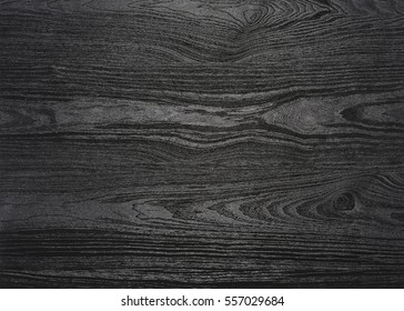 A Full Frame Black Wood Grain Surface