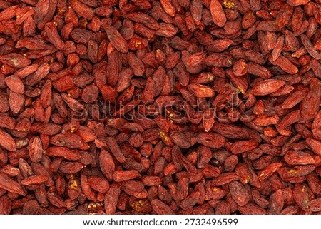 Full frame close up macro shot of dried Gojij berries.