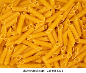 Full frame close up of penne pasta, top view