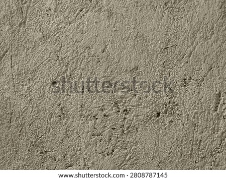 Full frame close-up shot of raw unfinished concrete plaster wall texture. Neutral warm gray grunge surface background for design overlays and 3D rendering
