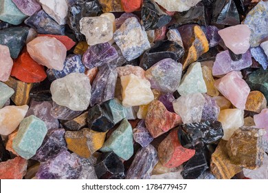 Full frame of colorful gemstones texture. Natural mineral stones close up