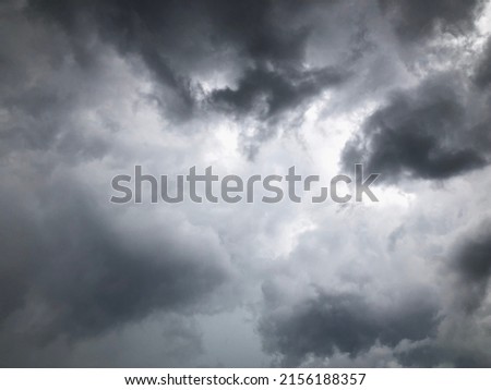 Full frame of dust overcast sky before to raining.Natural gloomy sky weather background. Dramatic storm cloudy and dark sky. Dark clouds sky.