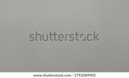 Full frame of grey painted wall texture background with fine grain bumpy surface