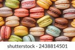 Full frame image of many colorful French macaroons from directly above. banner, background