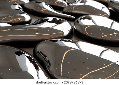 Full frame of monochrome abstract background representing gray colored drops of irregular shapes with shiny surface made of glossy metal fluid