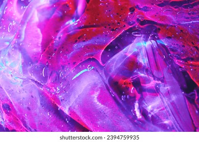 Full frame neon purple, magenta pink, red, blue holographic transparent cosmetic gel serum background texture, smudge slime with drips and bubbles. Abstract surreal psychedelic jelly backdrop. - Powered by Shutterstock