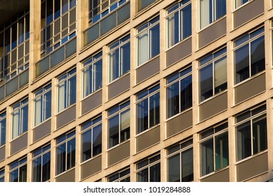 Full Frame Pattern Of Windows In A 60's Or 70's Style Office Block In London, UK