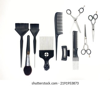 Full Frame Of Professional Hair Dresser Tools On White Background. Scissors And Comb, Brushes. Grooming Top View, Flat Lay Black Tools.