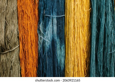 Full frame shot of colorful dyed yarn background. Colourful of dyed silk cotton from the natural colour.