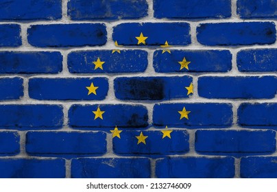 Full Frame Shot Of European Union Flag On Burnt Brick Wall. Unaltered, Backgrounds, Flag, Identity, Politics, Star Shape And National Flag.