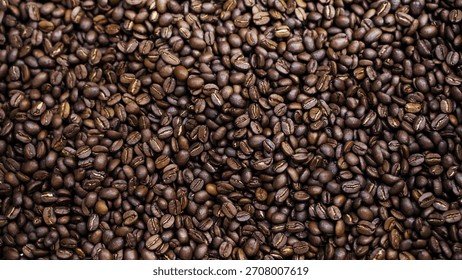 Full frame texture background of dark roasted coffee beans close-up