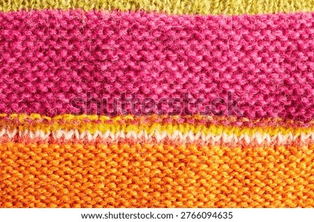 Full frame of the texture of knitted fabric made of wool thread.