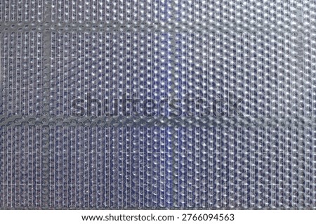 Full frame texture of portable solar panel cell.