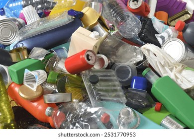 full frame of trash plastics and cans on white background