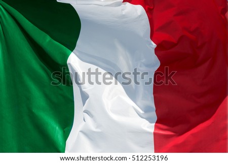full framed italian flag floating in the wind exact colors