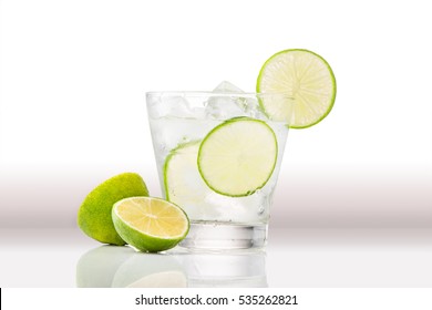 Full Glass Of Water With Lemon And Mint Isolated On White Background