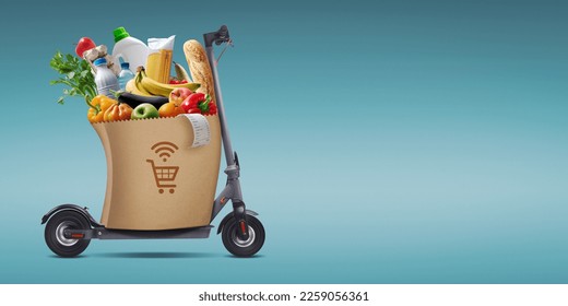 Full grocery bag on an ecological green scooter, online grocery shopping and delivery concept - Powered by Shutterstock