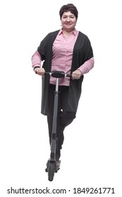 In Full Growth. Confident Mature Woman With An Electric Scooter